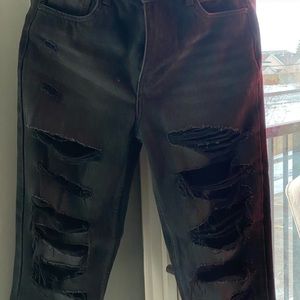 black distressed denim jeans